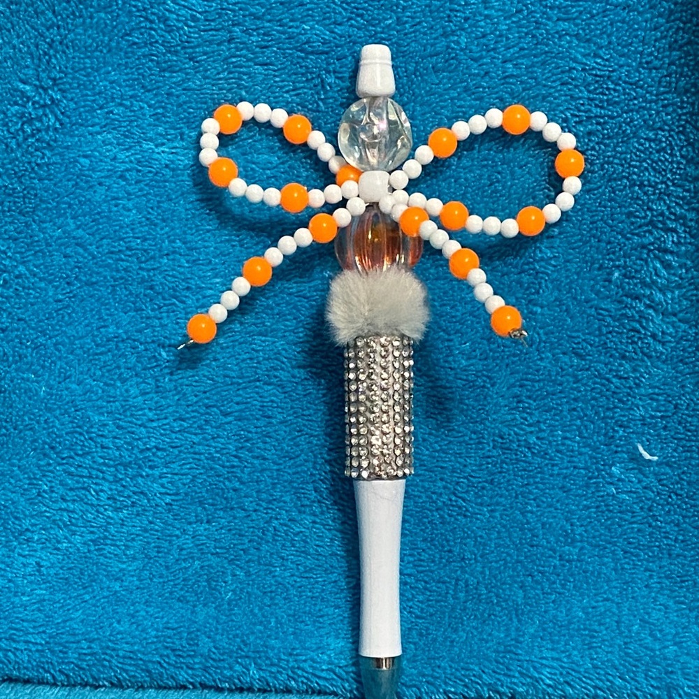 Beaded Pen with Orange and White Accents